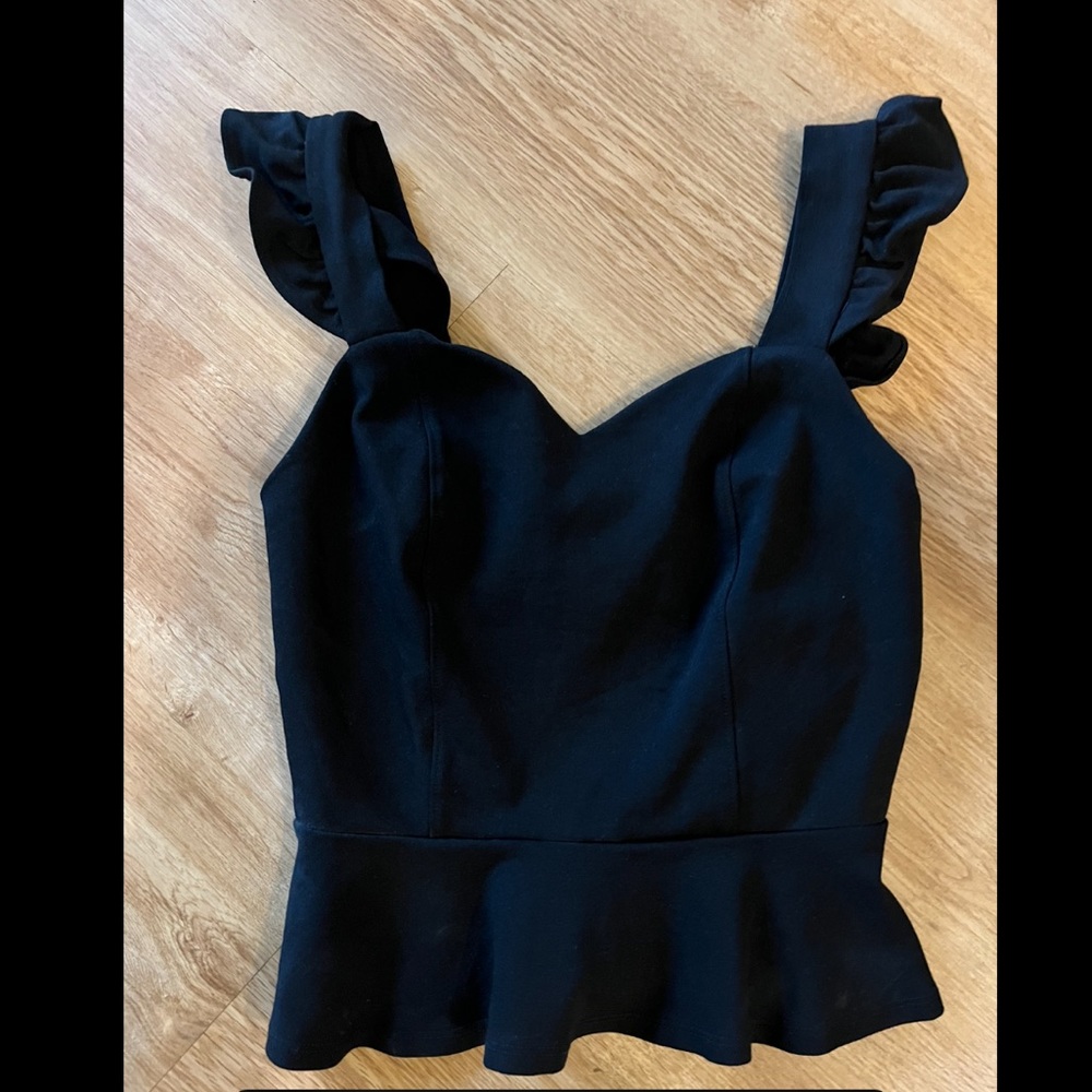 Eri & Ali ruffled sleeve, peplum black top from Anthropology.